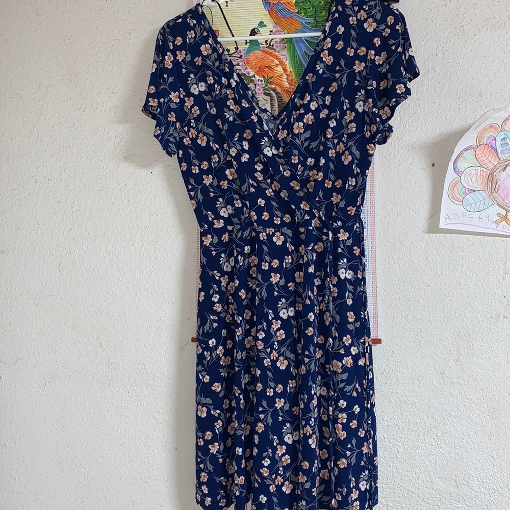 Navy blue, floral, causal dress. Brand is Kaileigh. Size, small. Brand new.